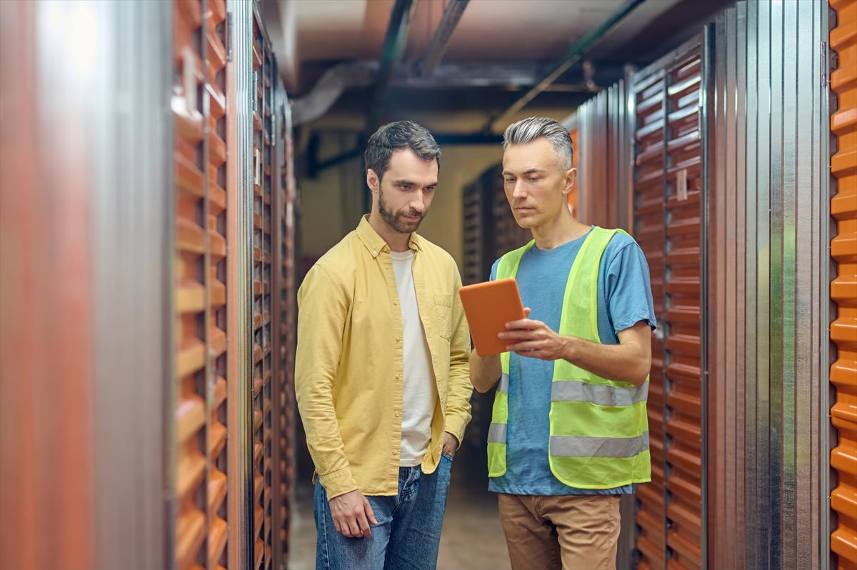 Reviewing quality data on a tablet in the warehouse